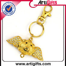 Gold plated enamel snow globe keychain